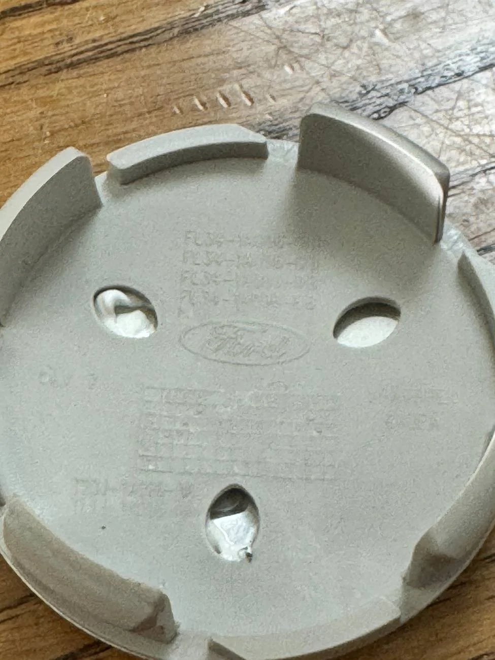 Ford Bronco Sasquatch wheel center cap Part Number? IMG_2226