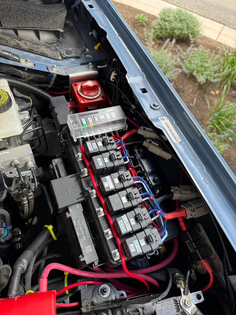 Ford Bronco Relays mounted to fuse box cover IMG_6865