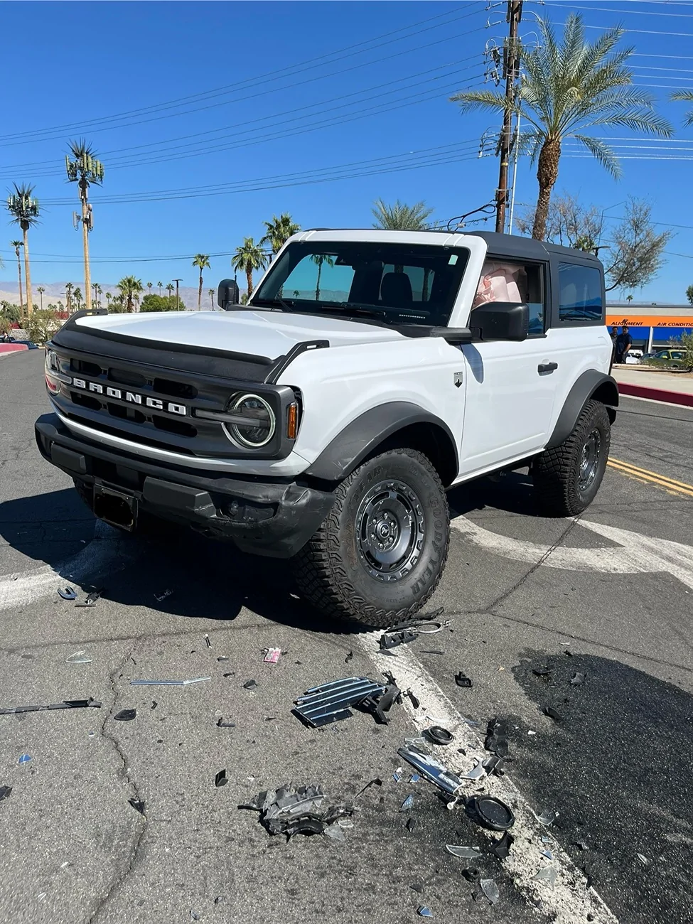 Ford Bronco Built Ford Tough! Hit by car running from police IMG_4128