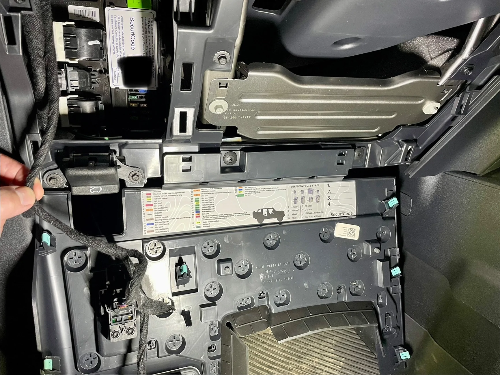 How to access the under steering wheel fuse panel? | Bronco6G - 2021 ...