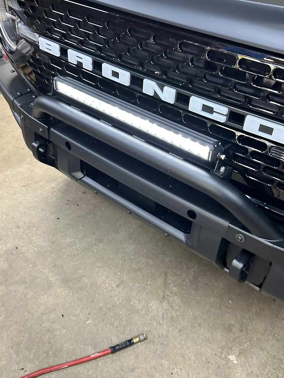 Ford Bronco Installed grille light bar and activation button IMG_3299