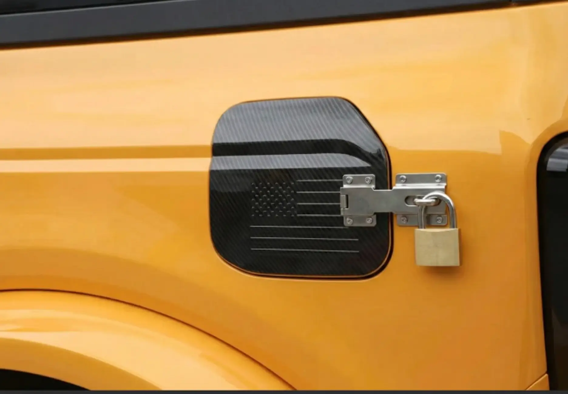 Ford Bronco Any company offer a locking gas cap for the bronco? Locking fuel filler door fits 21 thru 26 bronco