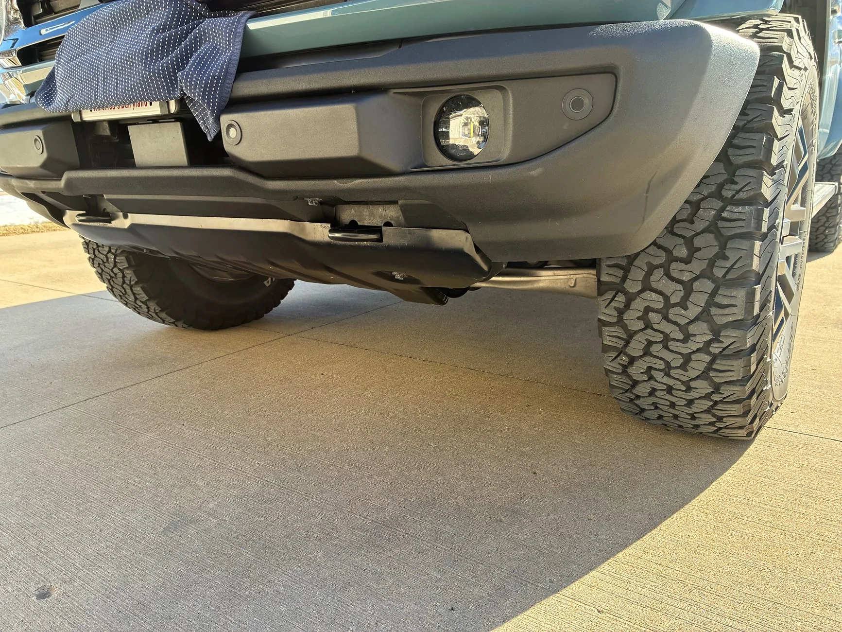 Ford Bronco OEM Steel bash plate modified to fit standard plastic bumper IMG_0497