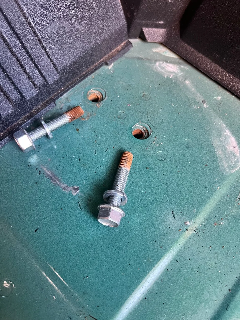 Ford Bronco Corroded cargo area tie down bolts IMG_1560