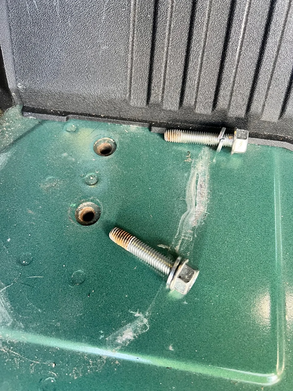 Ford Bronco Corroded cargo area tie down bolts IMG_1559