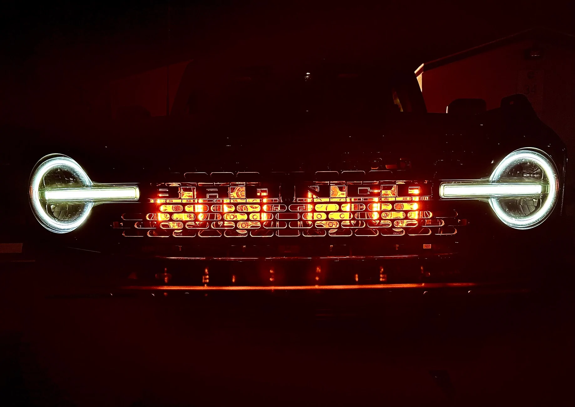 Ford Bronco Baja Designs Onyx6 10” light bars mounted behind the grill IMG_9178