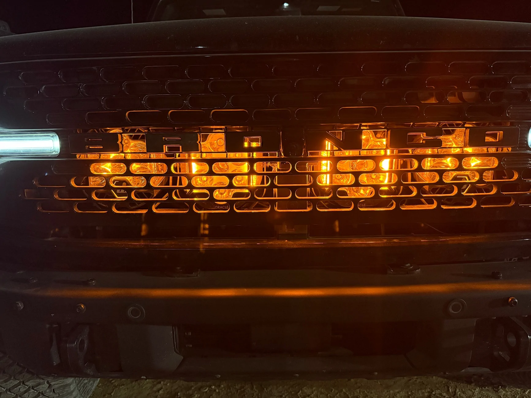 Ford Bronco Baja Designs Onyx6 10” light bars mounted behind the grill IMG_9092