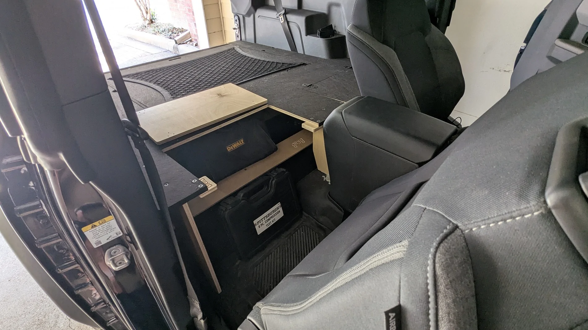 Ford Bronco 2 Door seats removed drawer systems? Under panel storag