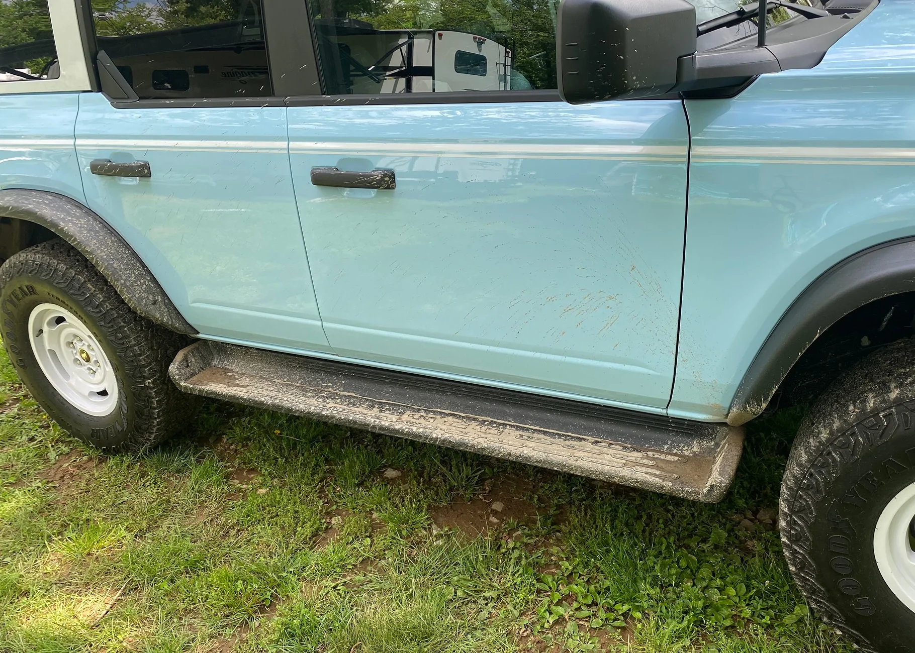 Ford Bronco Mud flaps in FRONT of back tires IMG_1871