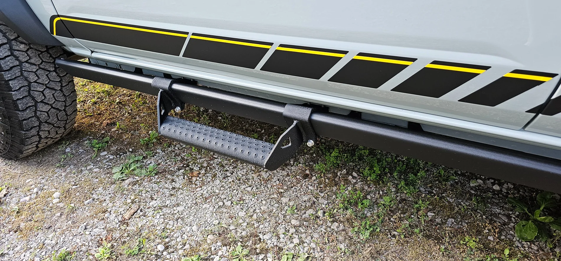Ford Bronco Best and cheapest side step I was able to find that attaches to factory rock rails. 20240713_194640
