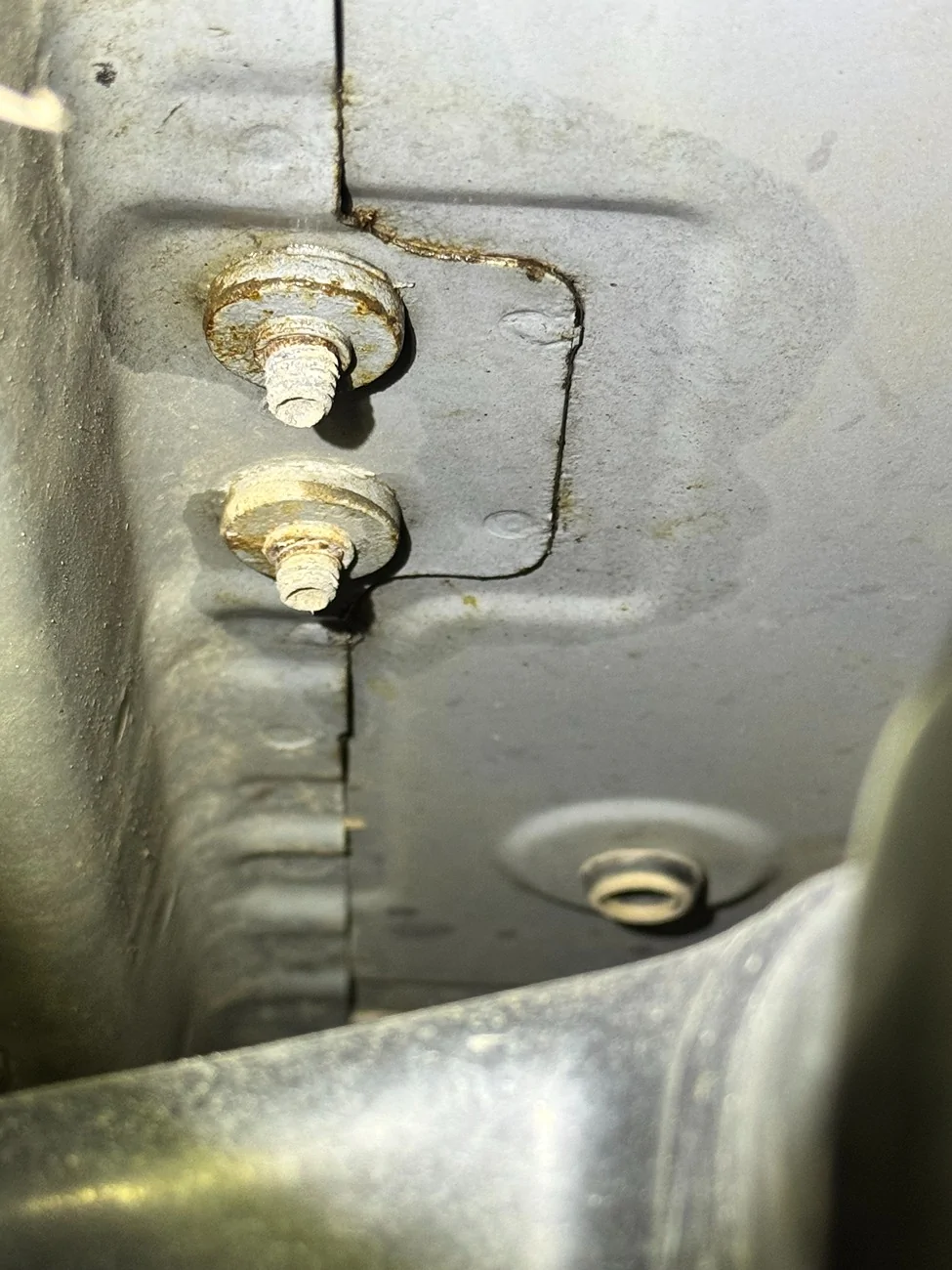 Ford Bronco Corroded cargo area tie down bolts IMG_4574