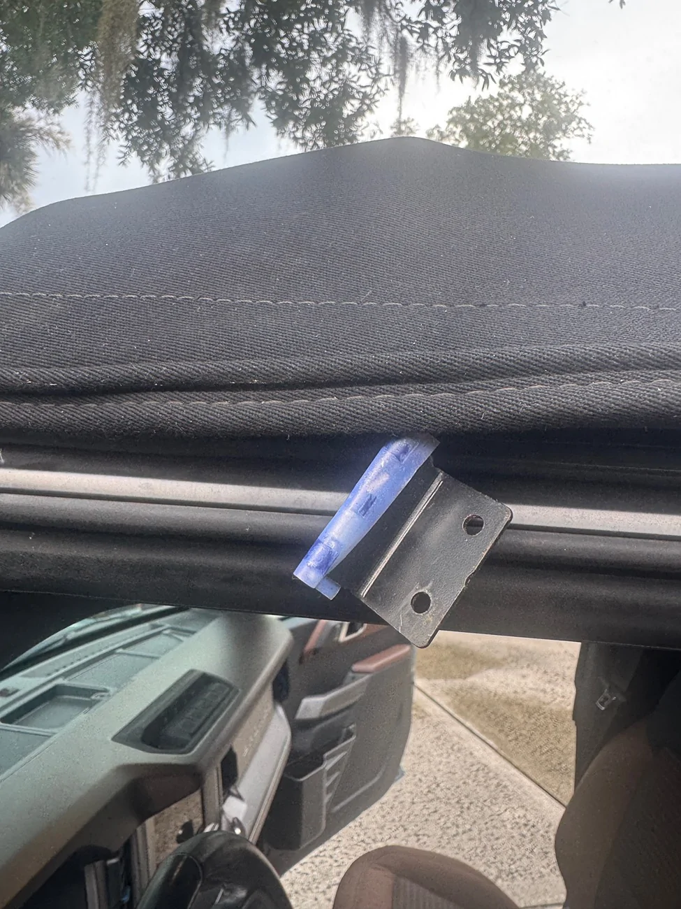 Ford Bronco Front left drivers side cable on soft top rivets sheared off IMG_4129
