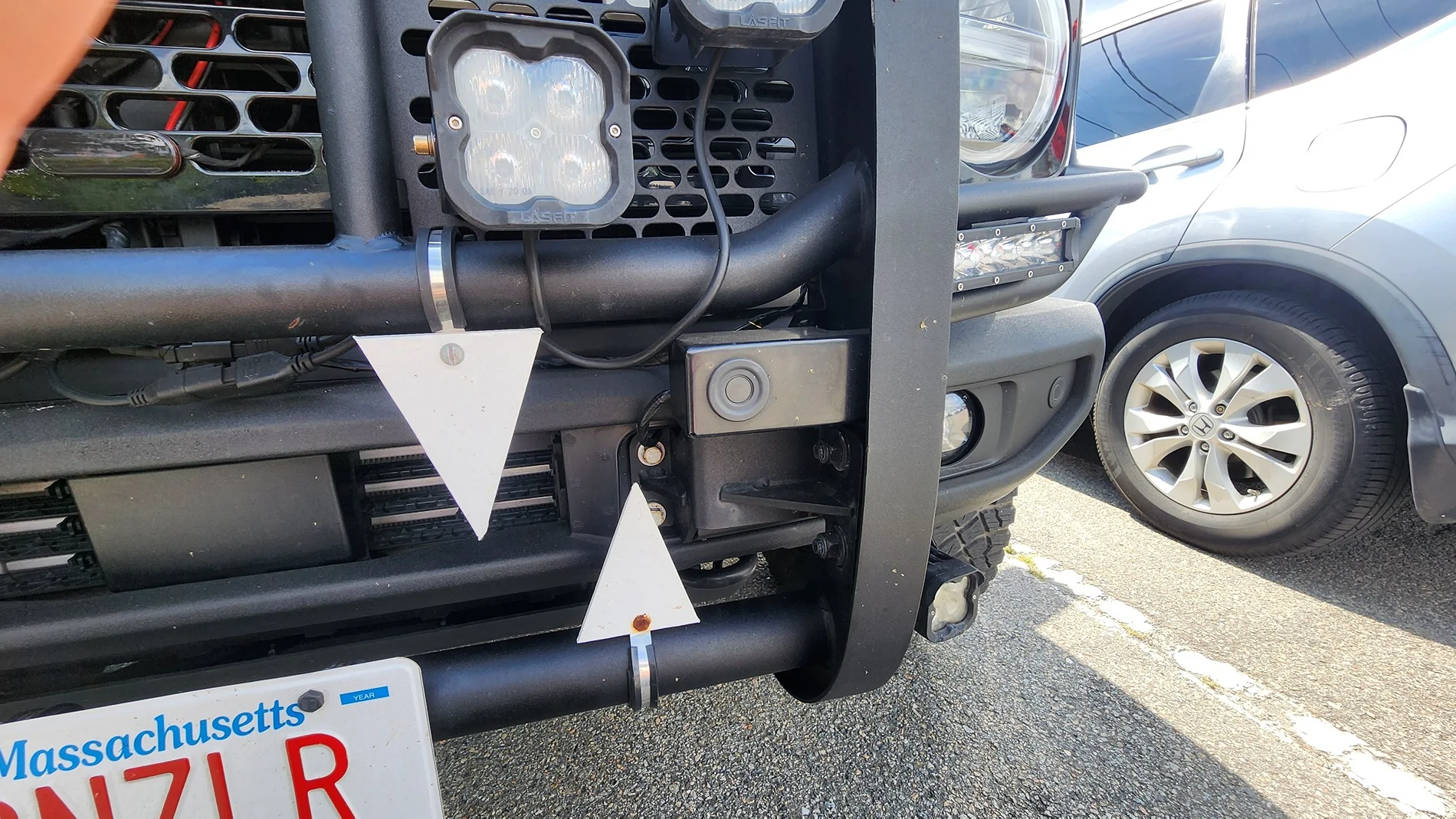 Ford Bronco Front middle parking sensors randomly beeping at me after relocating despite no obstructions 1000034233