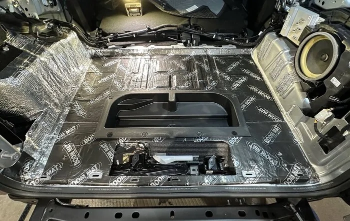 Adding Rear Factory Hitch, adding boom mat (sound deadening), upgrading Sub
