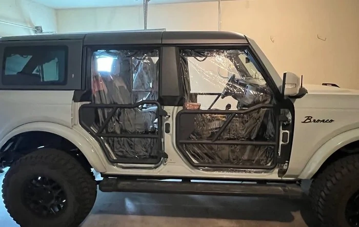 Makeshift DIY emergency rain cover/slow driving doors