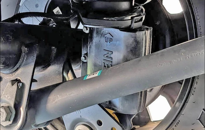 Rear shock recall done, shields installed. Pictures included