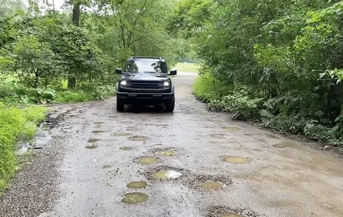 My Base Bronco Suspension vs Potholes! With Crawler Gear Action