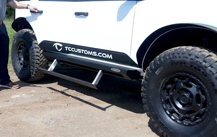 RockSlide Engineering Power Step Sliders installed on 4-Door Bronco