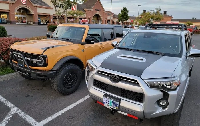 Cyber Orange First Edition Bronco next to my 4Runner