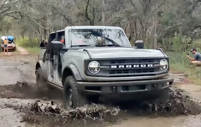 Lifted OBX mud stuck from the jump. Black diamond says- hold my beer!