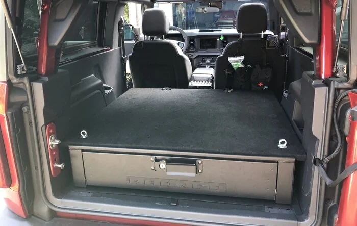 Ford cargo security drawer installed in a 2-door Bronco with rear seat delete