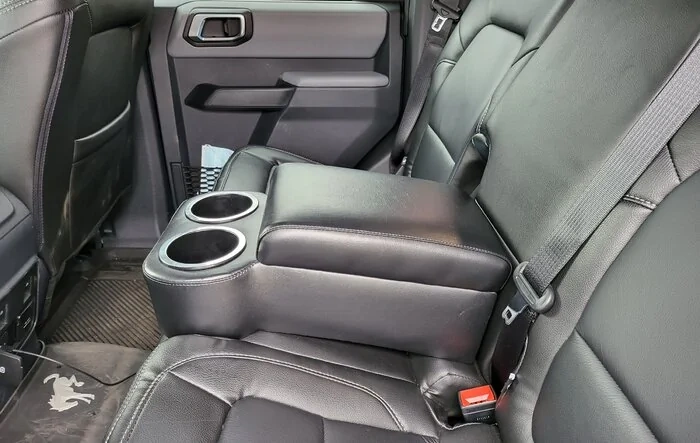 Rear cupholder armrest option that works (from a Mustang!)