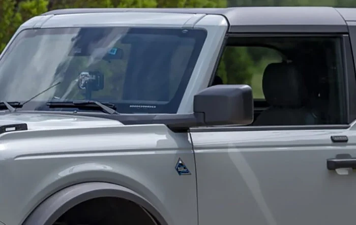 SSM 50324: Mirror Whistle Fix from Ford = redesigned mirror cap