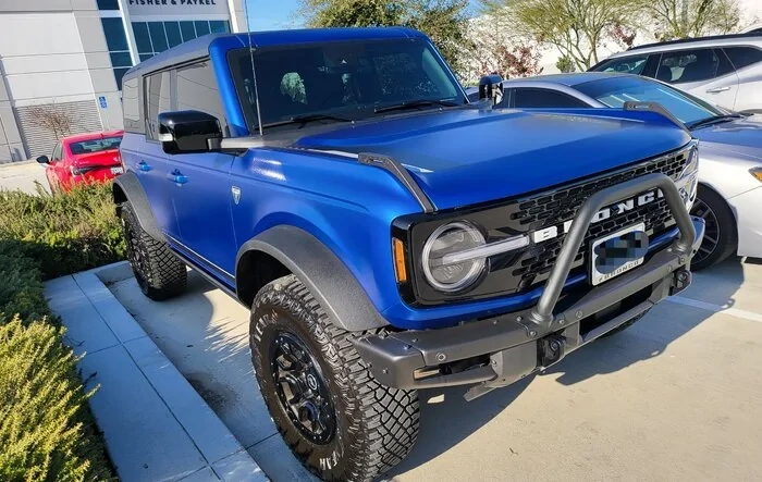 PPF Stealth Satin Wrapped Lightning Blue First Edition Bronco and now Stirrups!