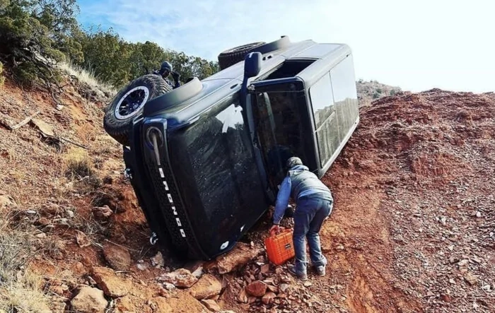 Oh Sh!$  2 Door Bronco with custom glass hardtop rolls over on trail