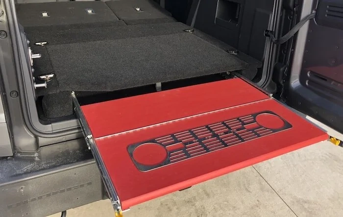 Bronco sliding tail gate and floor leveling