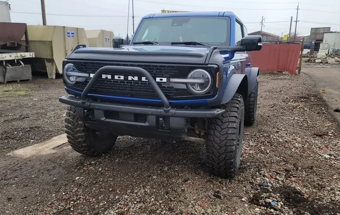 Ford metal fender flares ...(Bushwacker) and Trail Armor installed