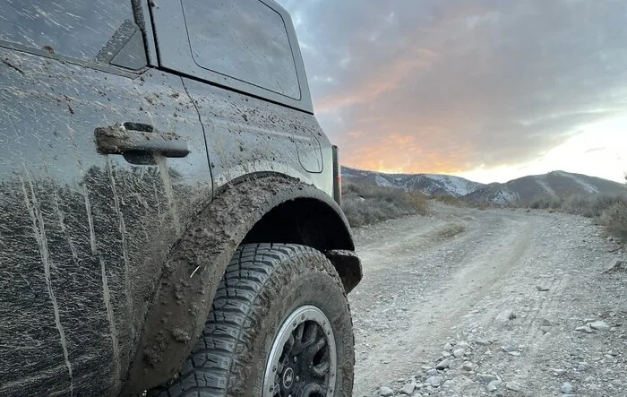 Delivery, mud, rocks, sunset, happiness
