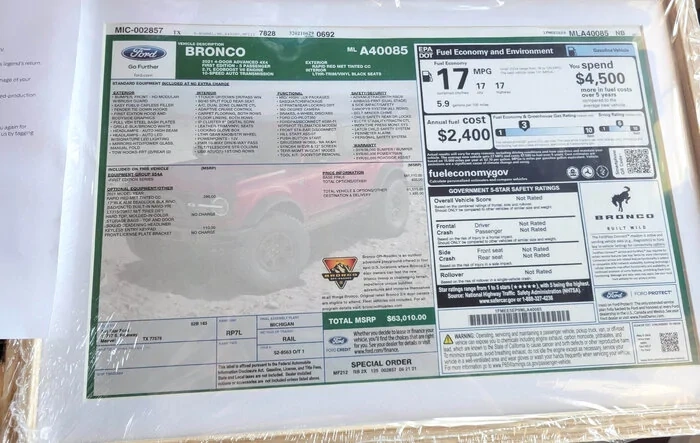 New First Edition swag from Ford: framed window sticker, authentication certificate, VIN console badge