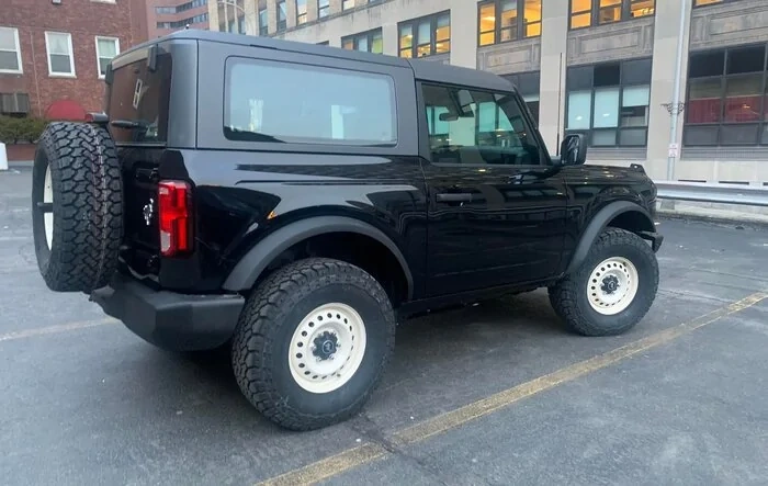 Base Bronco with off-white powder coat steelies and 33s