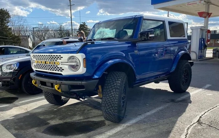 Lightning Blue Bronco Customized With White MIC Top, White Grill, Yellow Letters & Accents