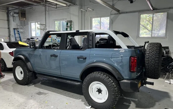 Roll sport bars wrapped in gloss white