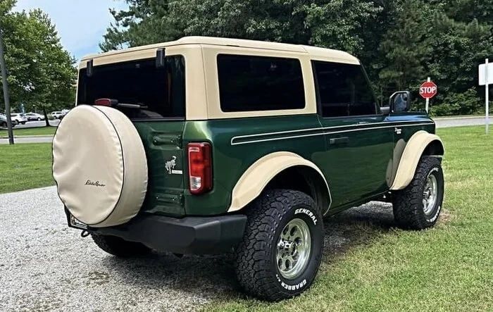 Eddie Bauer throwback Bronco 6th gen build w/ tan hardtop, fender flares, spare tire cover