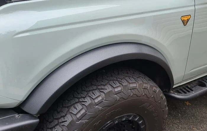 Wrapped my fender flares with carbon fiber