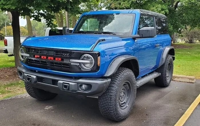 Heritage Edition Bronco 2-door in Velocity Blue w/ black flares and black MOD top