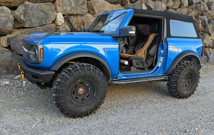 I made a Badlands tractor w/ Accelera Badak X-Treme, tallest 35" tires made