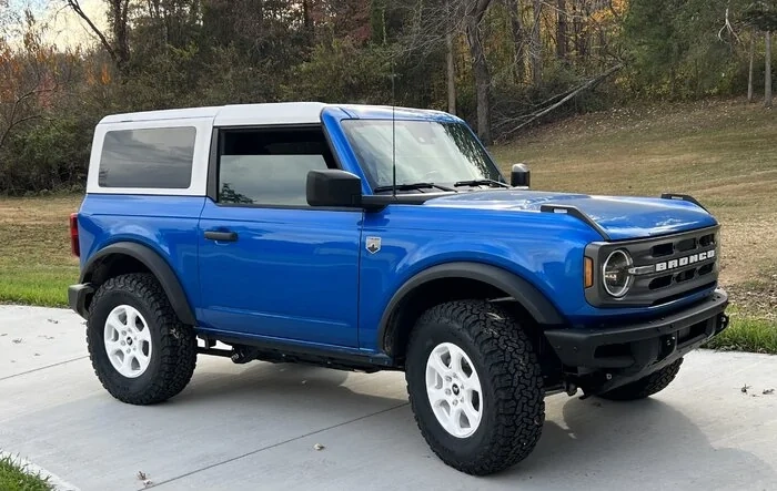 MIC hard top painted white using Raptor Spray Liner:  DIY how-to and photos