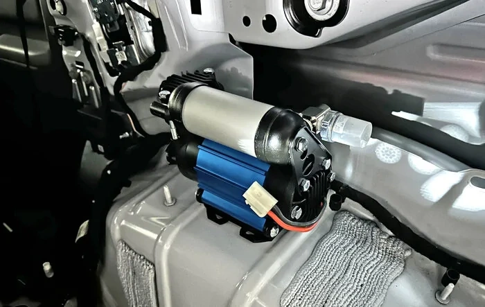 Installed Single ARB Compressor in the Trunk / Cargo Area