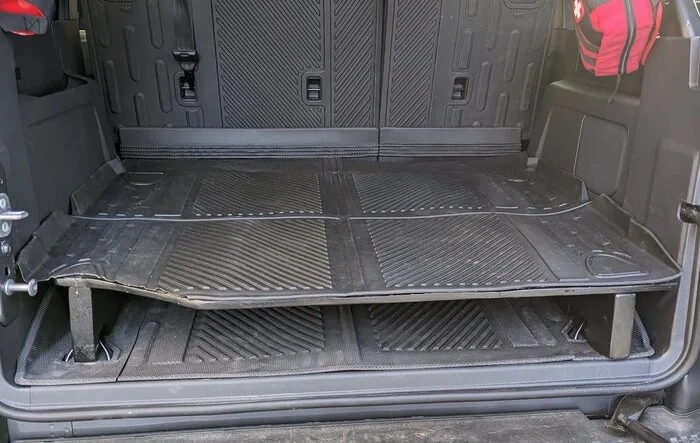 My custom Raised Trunk Cargo Platform that locks into floor D rings for security