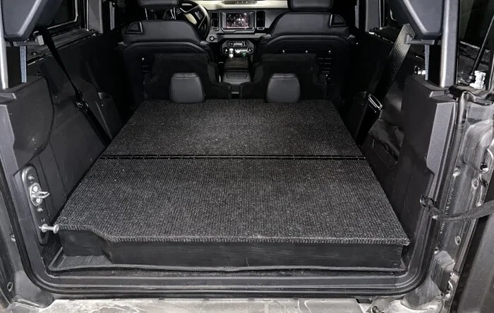Another custom 2-door rear cargo area level platform