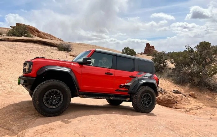Code Orange Bronco Raptor with XPEL PPF and XPEL Stealth on the Flares