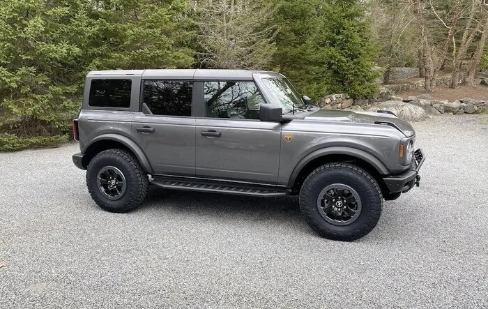 35X11.5 TOYO OC AT3 on Stock Badlands w/ No Lift