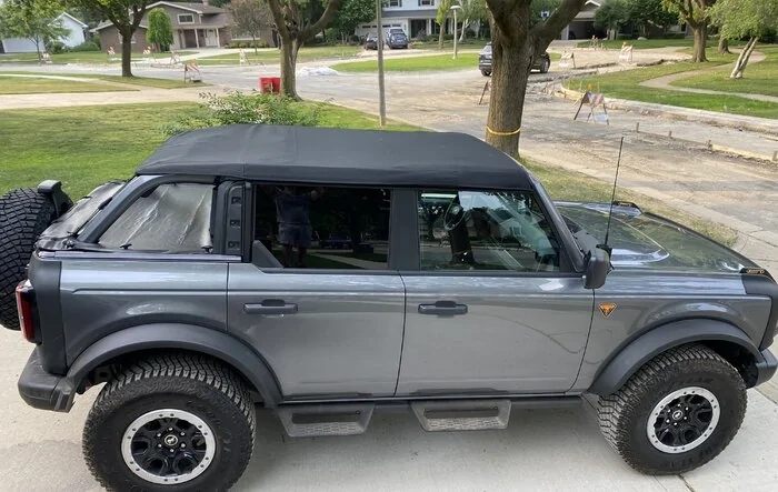 Bimini Top, windjammer, and  tonneau cover setup. Rainproof for most part