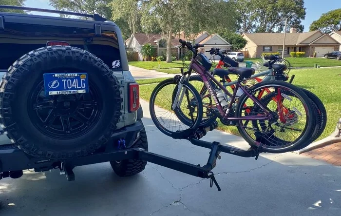KUAT 3 bike rack and swing away installed on Bronco
