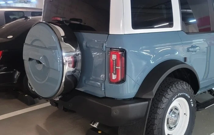 Spare tire cover made from tire cover, paint and stainless rims