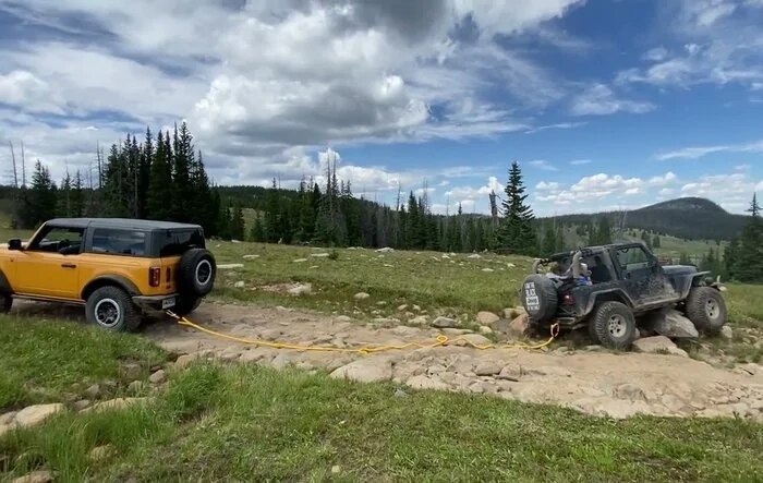 Pulling a stuck Jeep out with my Bronco